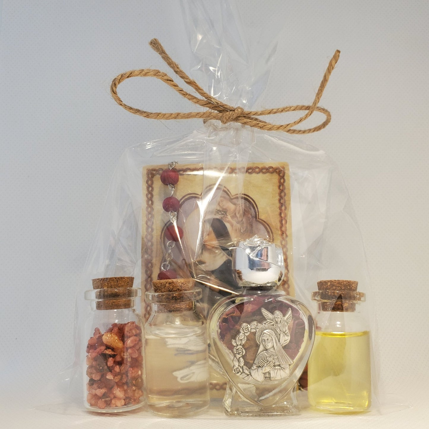 Saint Rita set of oil, water, rose incense, roses and relic card - Our Lady of Gifts