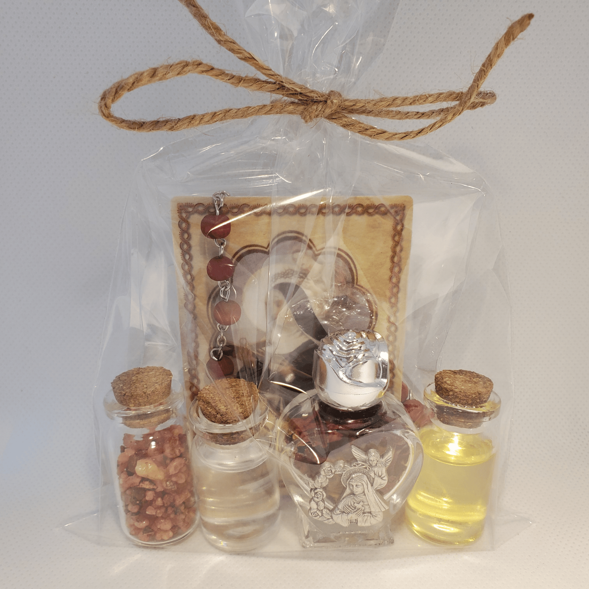 Saint Rita set of oil, water, rose incense, roses and relic card - Our Lady of Gifts