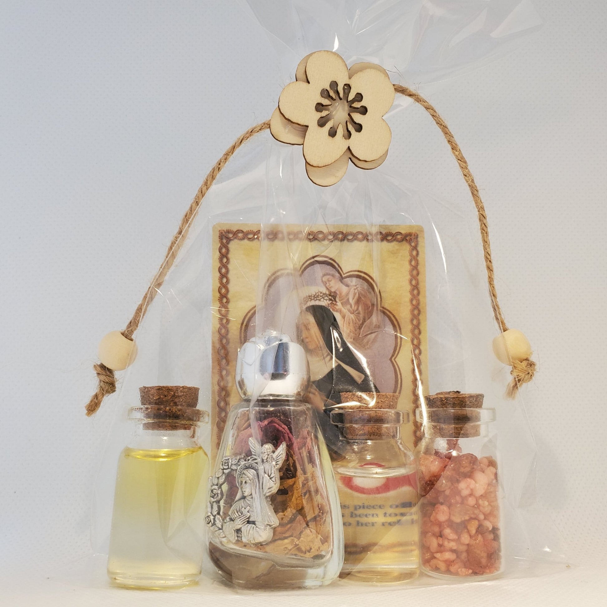 Saint Rita set of oil, water, rose incense, roses and relic card - Our Lady of Gifts