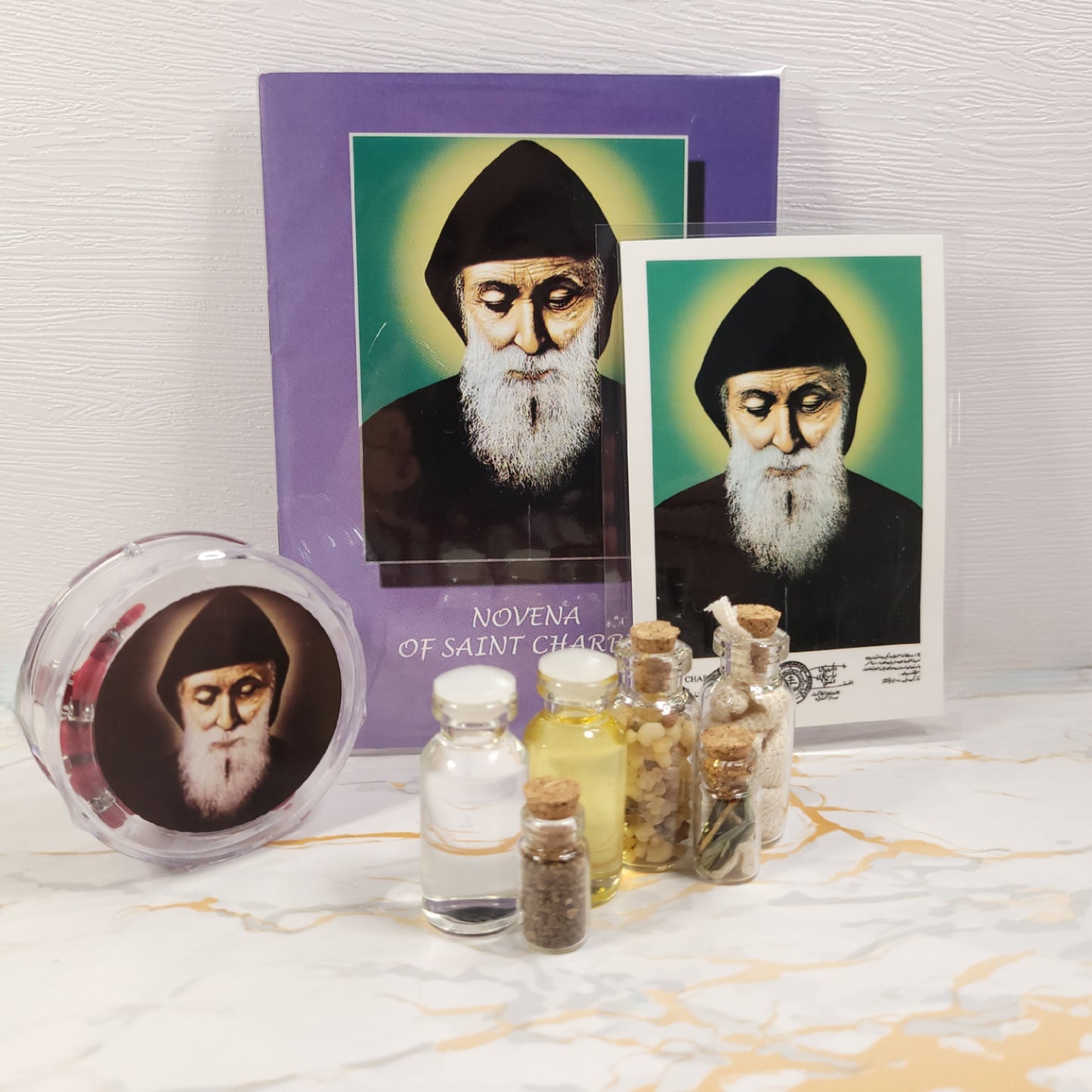 Set of oil, water, incense, soil, relic, rosary and novena booklet of Saint Charbel - Our Lady of Gifts